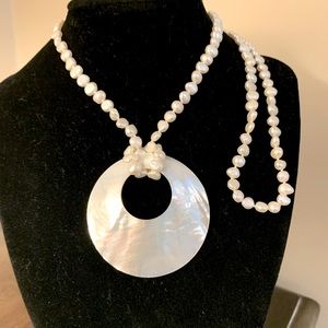 Cultured Pearl necklace with mother of Pearl pendant.